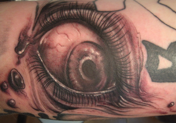 Bridget Tunstal - Eye ball tattoo